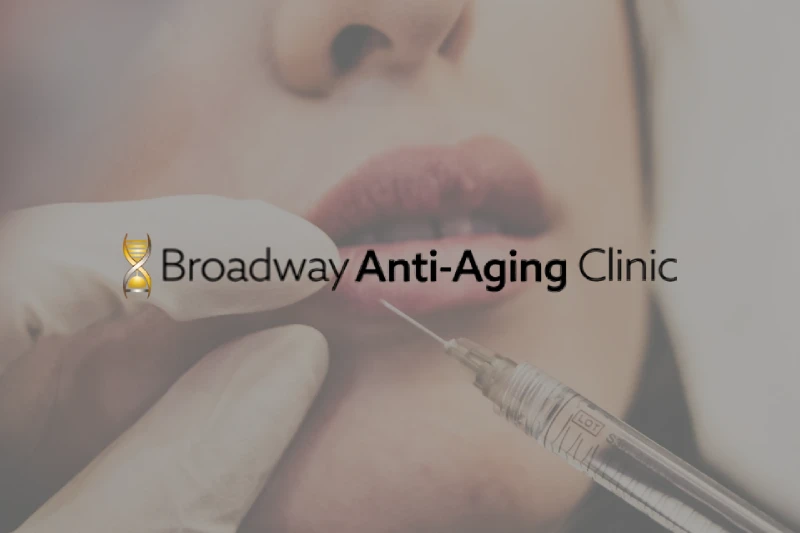 Close-up of a woman receiving a lip injection from a clinician at the Broadway Anti-Aging Clinic.