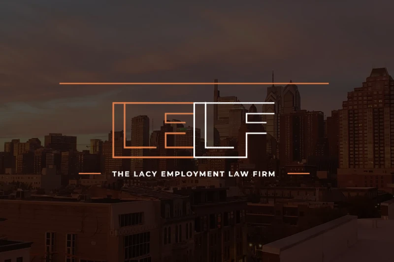 City skyline at sunset with the logo and name "The Lacy Employment Law Firm" overlaid in the foreground.